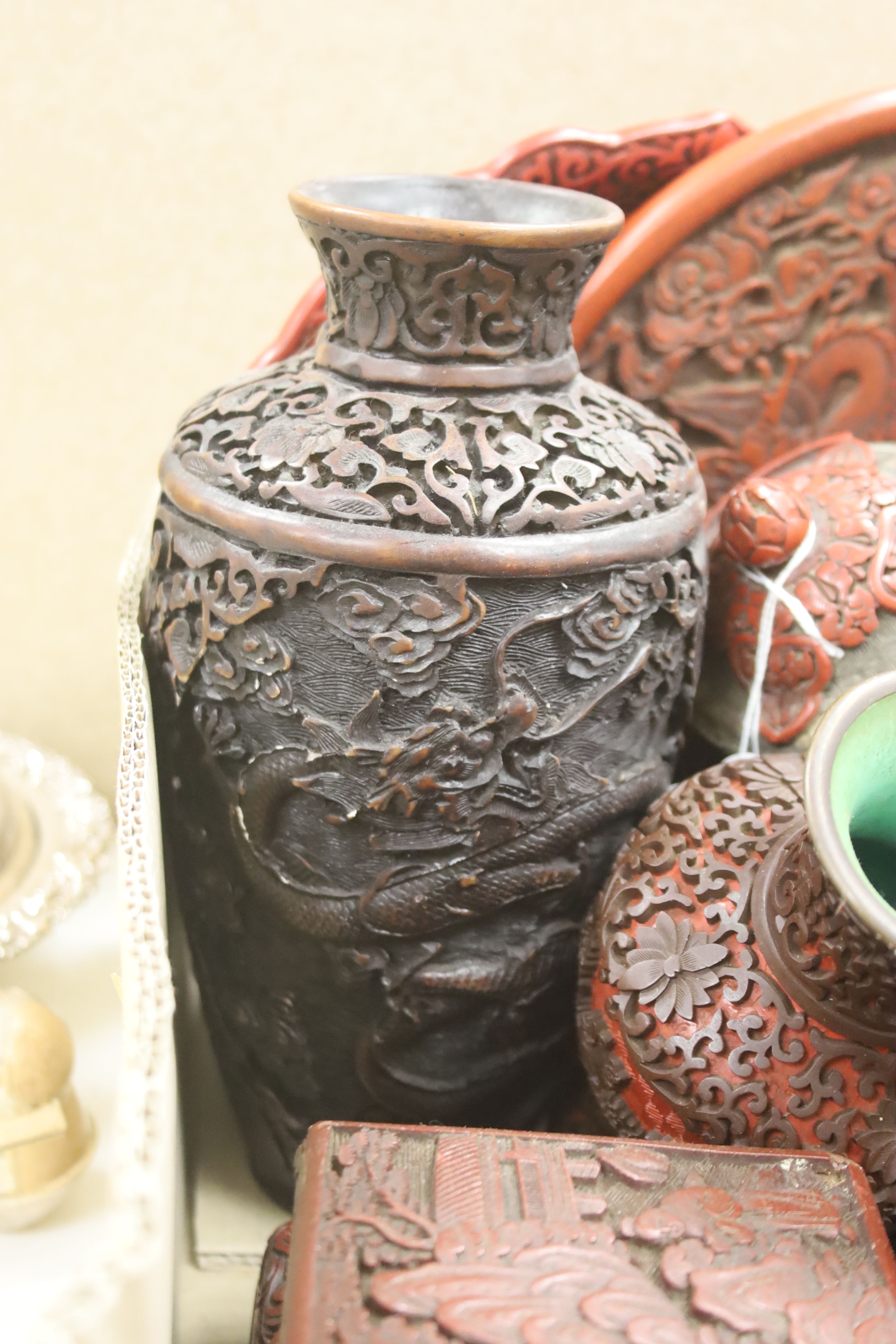 A quantity of Chinese cinnebar lacquer and simulated lacquer boxes, vases, etc.